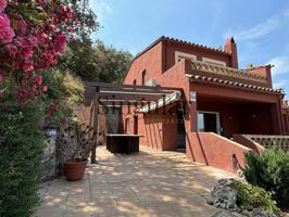 Casa adosada esquinera con jardín, piscina y vistas panorámicas al mar en Sa Riera photo 0
