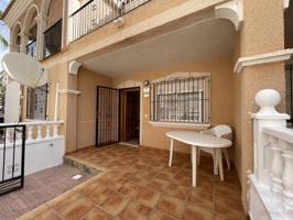 ADOSADO EN LA ZENIA CON PISCINA COMUNITARIA photo 0