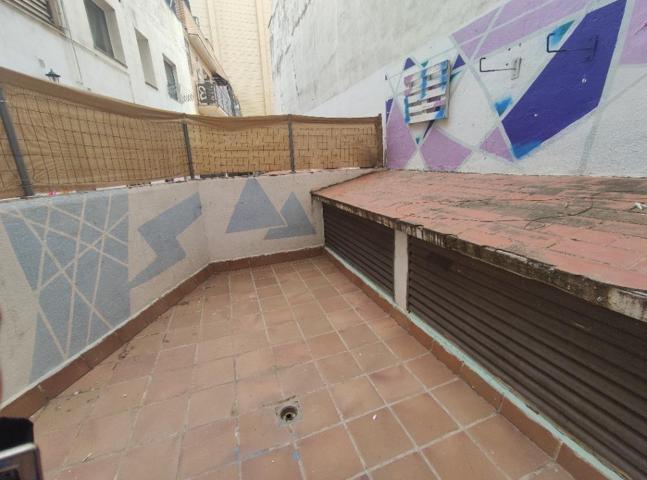 LOCAL EN RUBI CON TERRAZA photo 0