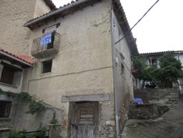 ASSO-VERAL (SIGÜÉS). COMARCA DE LA JACETANIA. GRAN CASA. ECONÓMICA. TERRAZA. GARAJE. TRASTERO. BODEGA. 6 DORMITORIOS. 2 BALCONES... photo 0