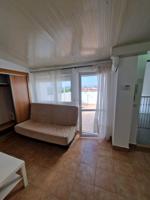 APARTAMENTO 1 Dormitorio con Terraza, totalmente amueblado, pintura lisa, cocina equipada con todos sus electrodomésticos, aire acondicionado (frío - calor). photo 0