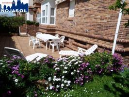 Ref. 002136: Bajo con jardín con mesa, sillas y toldo playa Ris photo 0