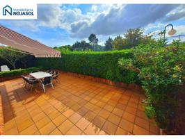 Ref. 002136: Bajo con jardín con mesa, sillas y toldo playa Ris photo 0