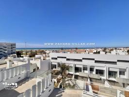 Promoción obra nueva terminada 'EL OASIS DE ZAHARA' viviendas adosadas junto al mar photo 0
