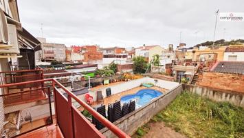 CASA ADOSADA - CON JARDÍN -  EN MALGRAT photo 0