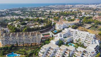 Apartamento de dos dormitorios bellamente reformado en la comunidad cerrada de Jardines de Andalucía photo 0