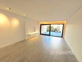 MAGNAPOL ALQUILA bajo con jardín de moderna construcción photo 0