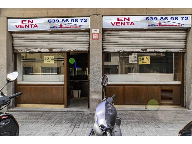 Local en venta con tres persianas a la calle photo 0