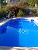 Chalet con piscina a la venta en El Rebolledo photo 0
