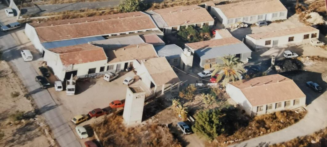 SE VENDE PARCELA EN LA CARRETERA DE MATOLA CON NAVES photo 0