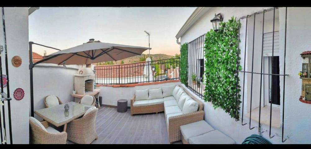 CASA ADOSADA REFORMADA EN CARABAÑA, 3 DORMITORIOS CON PATIO AMPLIO. photo 0