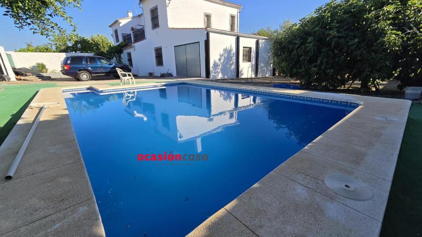 MAGNIFICA PARCELA CON VIVIENDA Y PISCINA photo 0