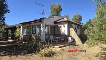 PARCELA CON VIVIENDA LEGALIZADA photo 0