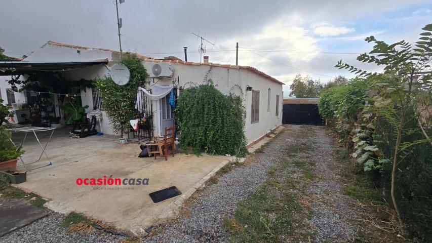 PARCELA RÚSTICA CON CASA Y COCHERA photo 0