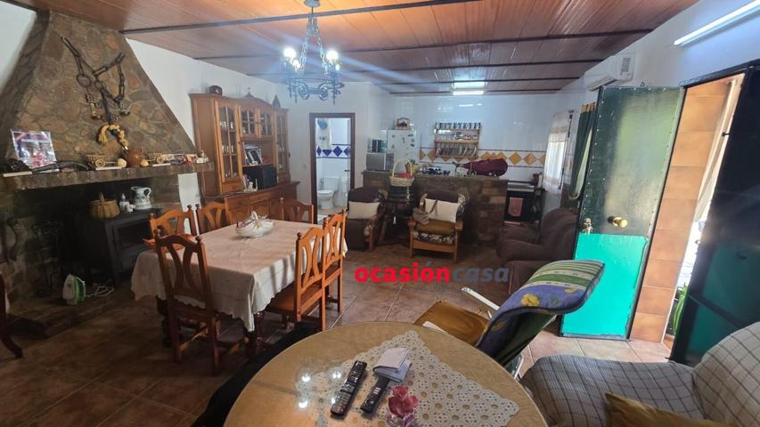 PARCELA CON VIVIENDA LEGALIZADA A LA VENTA photo 0