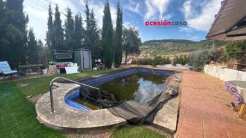 PARCELA CON VIVIENDA Y PISCINA A LA VENTA photo 0