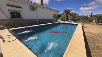 PARCELA CON VIVIENDA Y PISCINA photo 0