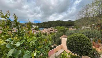 Vistas panorámicas y encanto rústico: descubre esta casa unifamiliar en Esporles, Mallorca photo 0