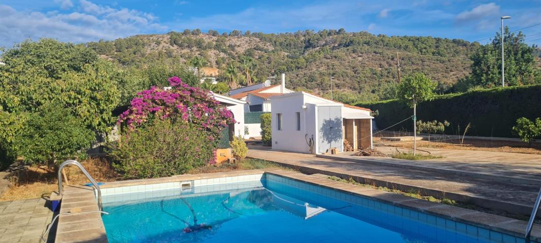 Terreno urbano con vistas a la montaña en Palmanyola – con edificaciones y piscina photo 0