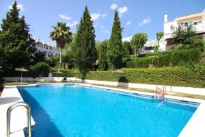 ACOGEDORA CASA ADOSADA EN VENTA EN EL COTO MIJAS photo 0