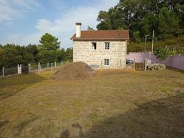 Casa rústica de piedra con terreno de 937 m² photo 0