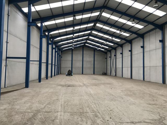 Nave Industrial junto al aeropuerto de Santander: ¡Espacio Ideal para Crecer! photo 0