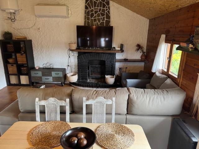PRECIOSA CASA DE MADERA EN VENTA EN CAN CLARAMUNT CON GRAN PARCELA DE 1.000 M2 photo 0