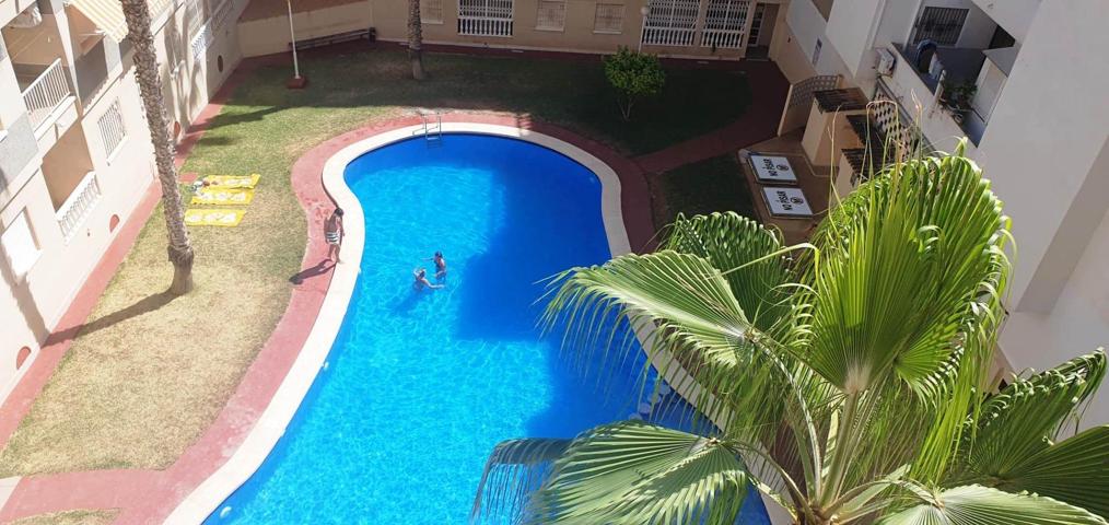 PISO DE 2 DORMITORIOS Y 1 BAÑO CON PISCINA COMUNITARIA photo 0