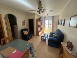 Bonito apartamento de 2 dormitorios, orientación sur y piscina comunitaria. photo 0