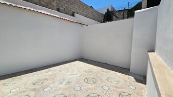 CASA EN PLANTA BAJA CON PATIOS photo 0