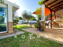 IMPRESIONANTE CHALET INDEPENDIENTE DIVIDIDO EN DOS VIVIENDAS EN TORREQUINTO photo 0