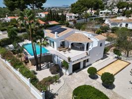 Moraira se vende encantadora casa ibicenca en una planta cerca del pueblo. photo 0