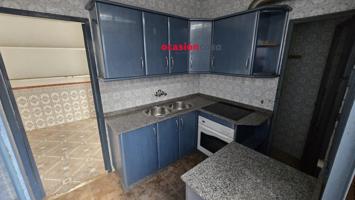 CASA CON ACCESO A 2 CALLES photo 0