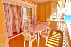 Apartamento amplio en segunda línea de playa con terraza con vistas al mar y garaje doble incluido photo 0