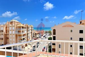 Ático dúplex en venta en Guardamar del Segura con vistas frontales al mar photo 0