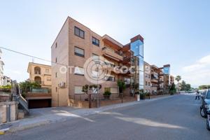 PLANTA BAJA CON TERRAZAS PARKING Y TRASTERO EN RIUDOMS photo 0