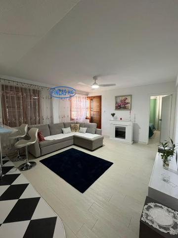 Acogedora vivienda reformada con garaje photo 0