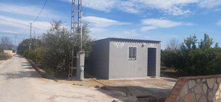 Venta de parcela rústica + caseta con luz en Almazora (Castellón) photo 0