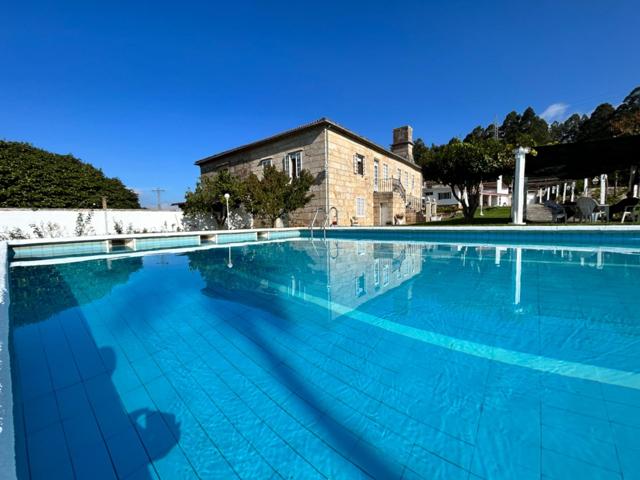 SE VENDE ESPECTACULAR CASA CON PISCINA Y AMPLIO JARDÍN CON ARBOLES FRUTALES EN PADRON photo 0