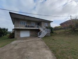 CASA DE PIEDRA CON TERRENO EN VENTA EN ARAÑO photo 0