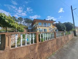 CASA CON TERRENO Y GALPON EN VENTA EN ASADOS RIANXO photo 0