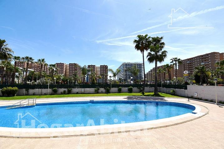 SEMINUEVO CON PISCINA, GARAJE Y 3 TERRAZAS CERCA DE LA PLAYA photo 0