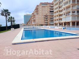 ¡A ESTRENAR! CON PISCINA, TERRAZA ESQUINERA Y GARAJE EN PRIMERA LÍNEA DE PLAYA photo 0