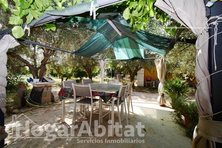 ¡OPORTUNIDAD DE INVERSIÓN! CHALET PARA REFORMAR CON TERRAZA Y PARCELA photo 0