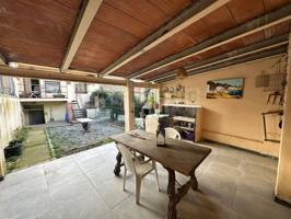 Casa rústica en venta con jardín, porche cubierto y barbacoa en La Bisbal d'Empordà photo 0