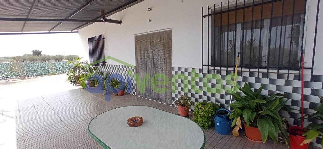 2 Casas con terreno y 2 naves photo 0