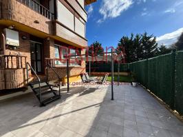BAJO CON JARDÍN COMPLETAMENTE REFORMADO, A UN PASO DEL CENTRO. NOJA photo 0