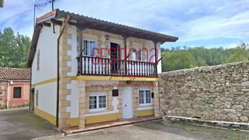 CASA COMPLETAMENTE REFORMADA EN ARENAS DE IGUÑA. photo 0