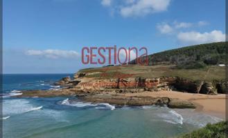 CHALET PAREADO A 300M DE LA PLAYA DE GALIZANO. photo 0