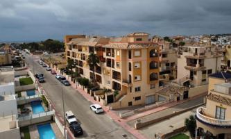 AMPLIO ATICO CON GARAJE, PISCINA Y GRAN TERRAZA CON VISTAS AL MAR EN ORIHUELA COSTA photo 0